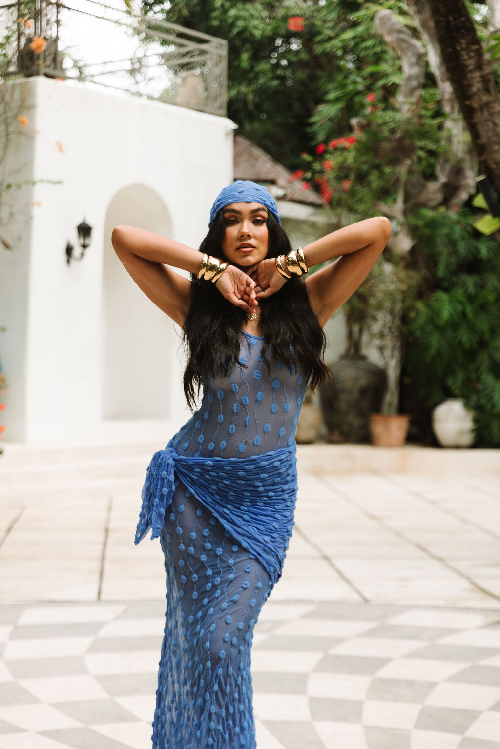 The Amalfi Dress in Amalfi Blue, worn with the Dolce Scarf as a waist tie.